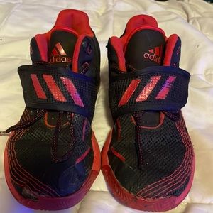Adidas red and black shoes